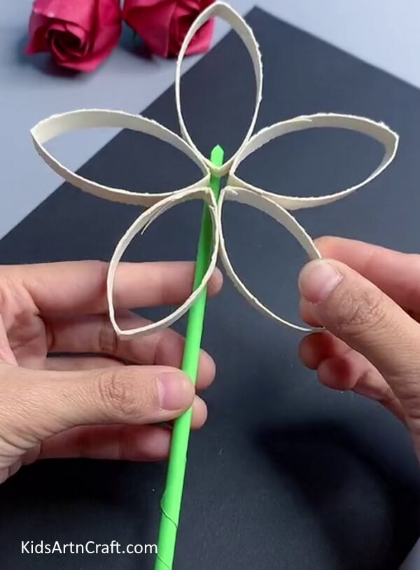 Pasting Stem To Flower - Crafting Flowers Out Of Recycled Cardboard Tubes With A Step By Step Guide