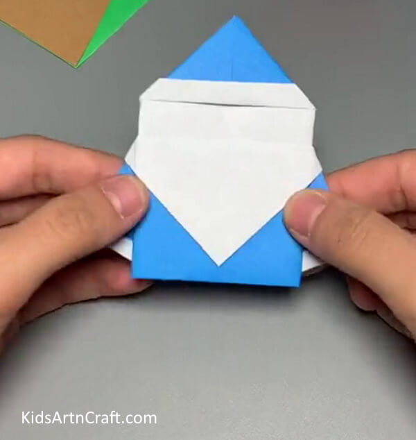 Turning The Sheet Again-Making a Santa Claus out of paper for Christmas with children 