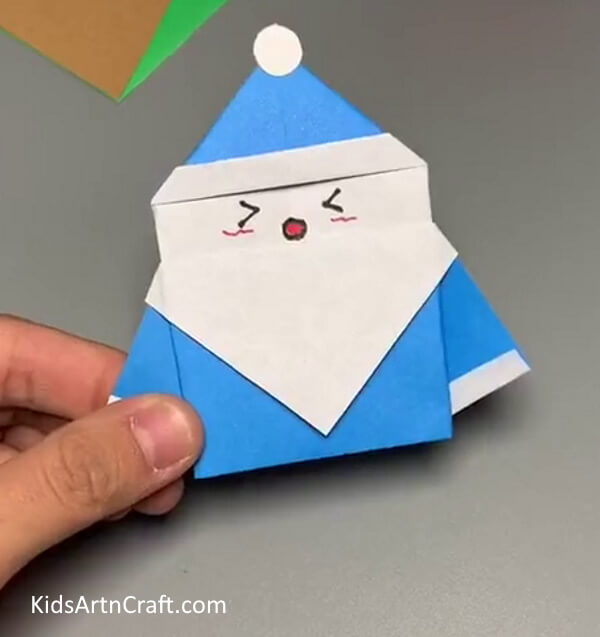Make a Happy Face On It- Creating a Santa Claus out of paper as a Christmas activity for kids 