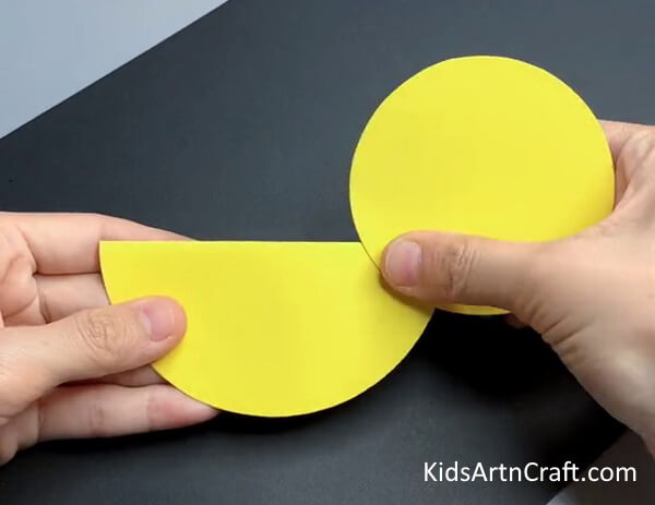 Pasting Another Circle- Crafting a Child-Friendly Paper Chicken 