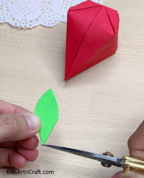 Cutting Leaves Easy Directions for Making a Strawberry out of a Paper Plate 