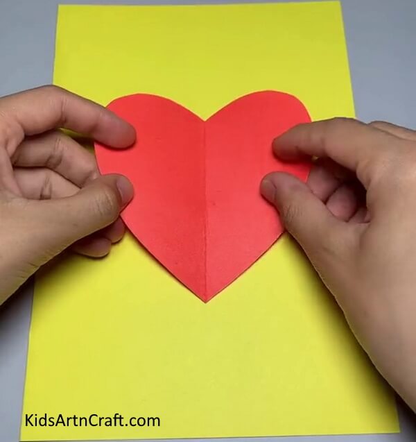 Pasting Heart On Paper - Gain knowledge of constructing a Strawberry art from Paper