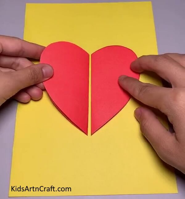 Pasting Heart To The Middle - Figure out how to form a Strawberry craft using Paper