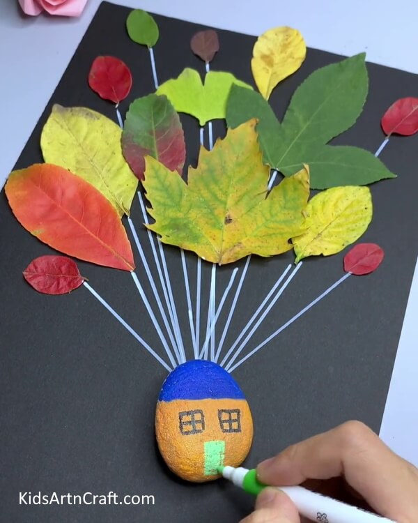 Painting Pebble As House - Homemade Flying Home Crafted Utilizing Autumn Leaves