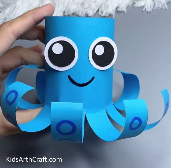 Making The Octopus Smile A Tutorial to Assist Kids in Crafting an Octopus Paper Art