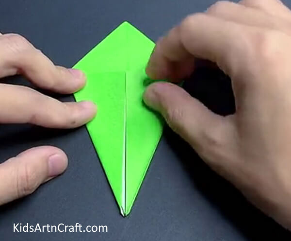 Flipping and Repeating-A do-it-yourself guide for children to craft an origami dragonfly. 