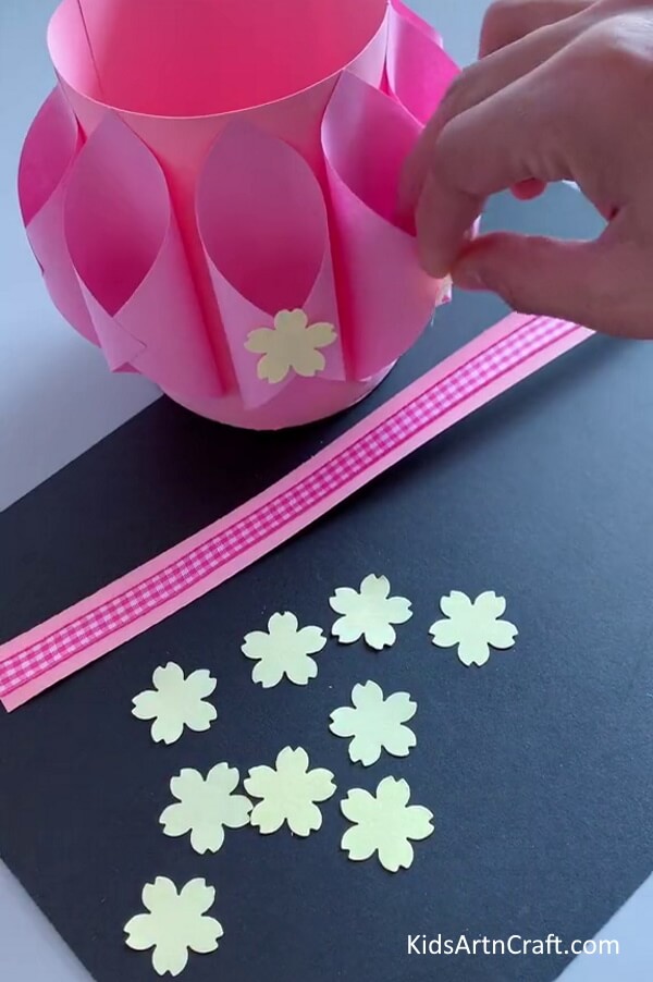 Pasting Paper Flowers - Making a paper basket out of items you have in your residence.
