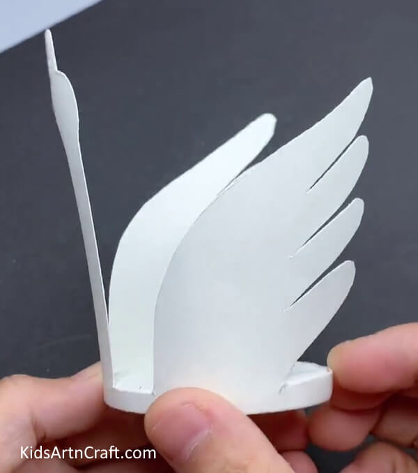 Cutting Swan Out Of Paper Cup - Crafting a Swan From Recycled Paper Cups: A Guide for Kids