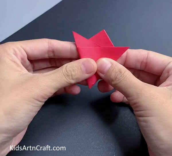 Folding The Other End - Step-by-Step Instructions for Crafting Paper Blooms with Kids