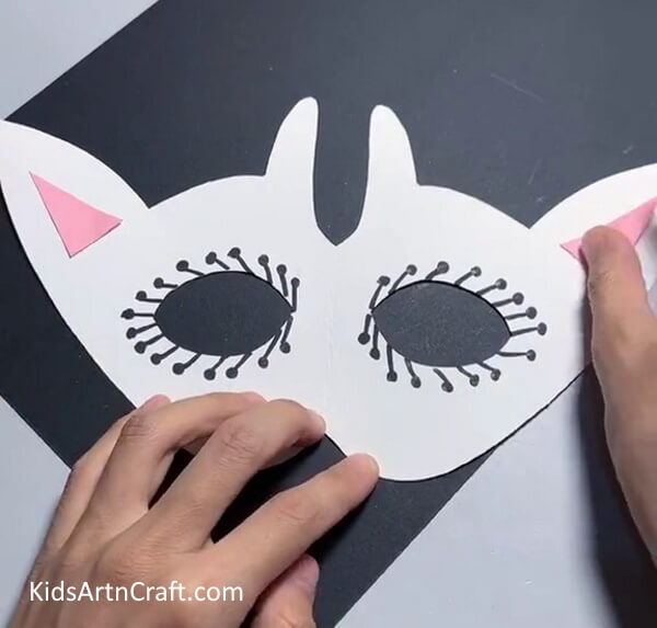 Making Ears- A guide on how to make a paper mask tailored to children. 