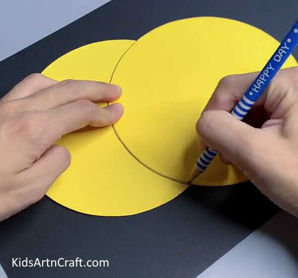 Make a Mark With a Pencil On The Sheet-Making a Wall Decoration with Paper Moons and Stars for Kids