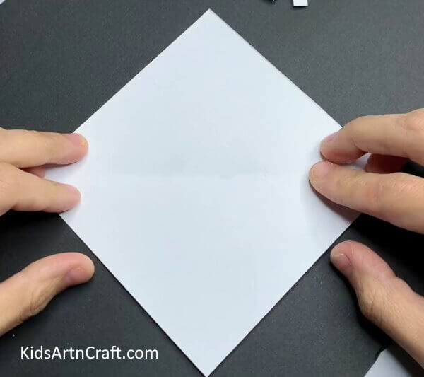 Take a Square Shape Paper-How to Make Paper Snowflakes - A Step-by-Step Guide for Children 