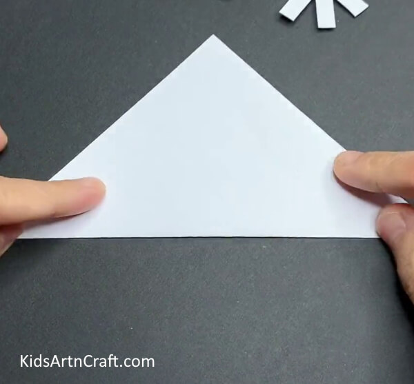 Fold It Into Two Halves-Crafting Snowflakes Out of Paper - A Step-by-Step Guide for Kids 