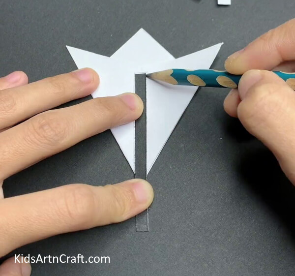 Using The Stencil Create The Crease As Shown-Step-by-Step Tips for Making Paper Snowflakes with Kids 