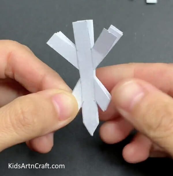 Open The Cutout So Formed-DIY Snowflakes from Paper - A Step-by-Step Guide for Children 