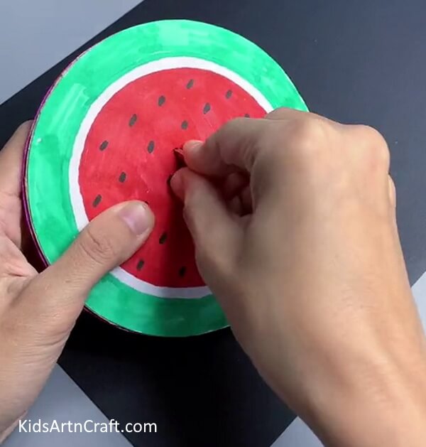 Inserting Coin In Cut - Appealing Paper Watermelon Creation For Early Learners