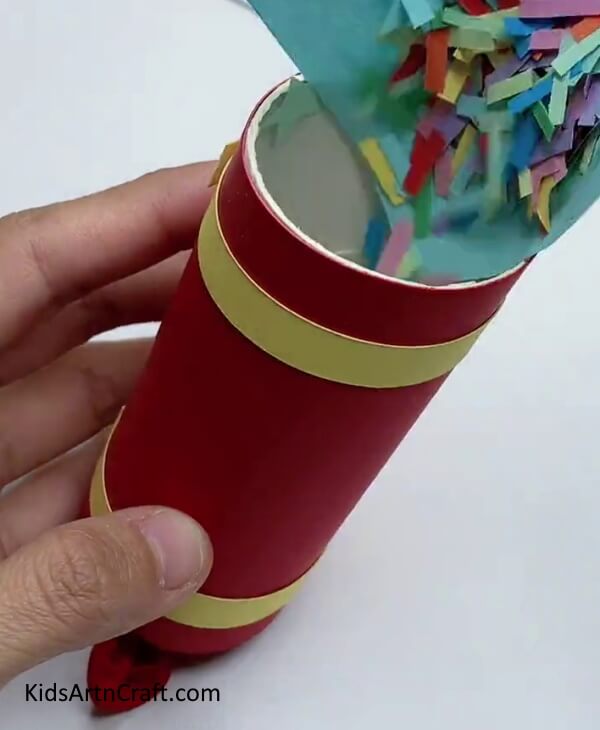 Adding Confetti In Roll - Construct a Party Popper with Youngsters That is Fun