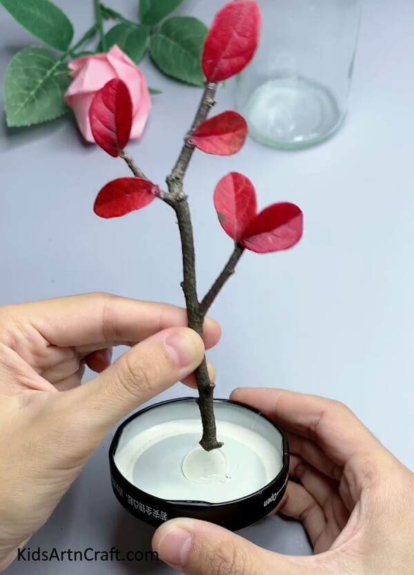 Pasting Stem On the Lid Of the Glass Jar - Quick Wall Decor Artwork Crafting Tutorial With Step-by-Step Directions
