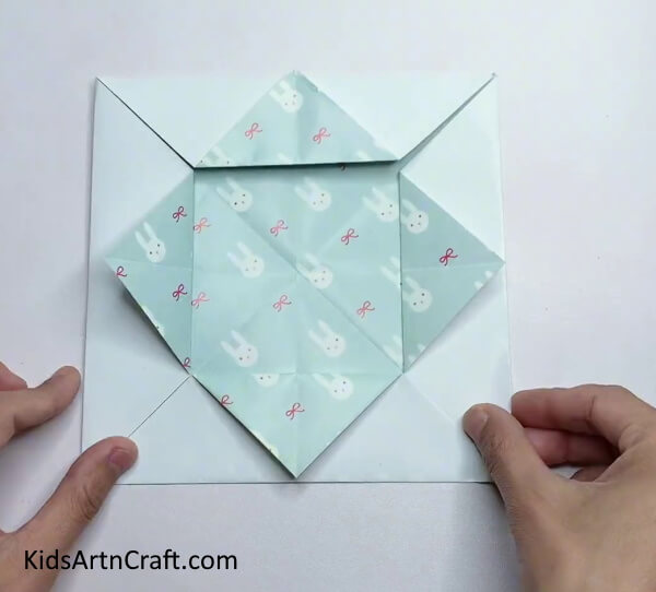 Folding Each Corner - A creative cardboard box activity for the youngsters.