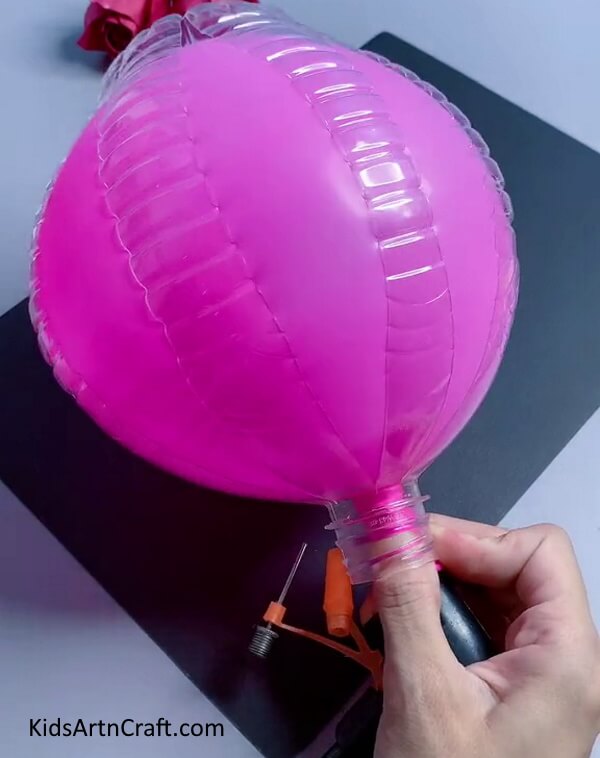 Blow the balloon up. Complete tutorial to make a Easy Bunny Craft Using Recycled Plastic Bottles