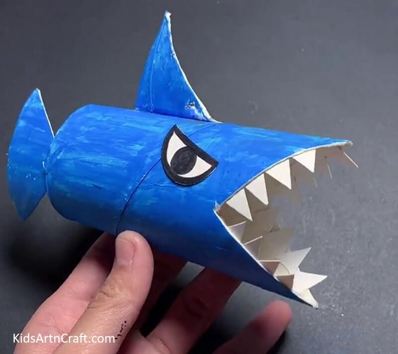 Cardboard Tube Shark Craft Is Done! - A creative activity for kids to craft a shark out of recycled cardboard tubes.