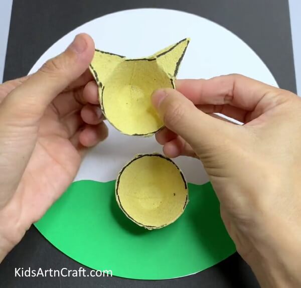 Taking Both Shapes Out Get step-by-step instructions on how to craft pig shapes from egg cases.