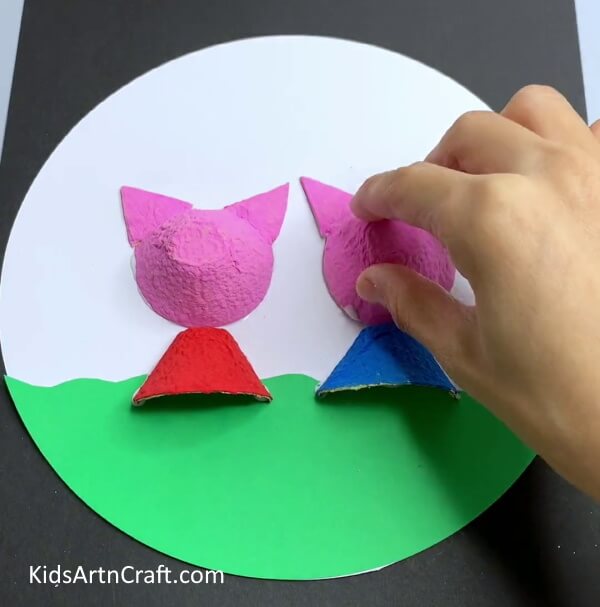 Pasting The Other Cutouts Create adorable piglets from egg cartons with this tutorial designed for kids.