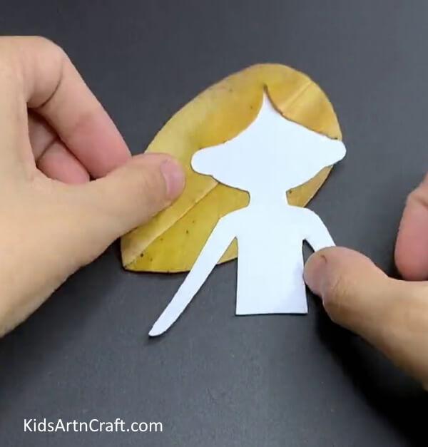 Pasting The Figure- How To Do Leaf Art Projects With Kids In The Fall 