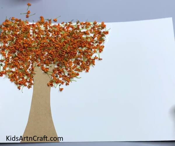 Pasting Leaves On Tree - Captivating Autumn Leaf Creations For Kids