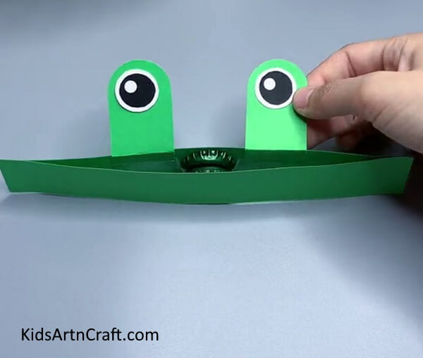 Pasting Another Eye - A DIY paper frog craft for kids