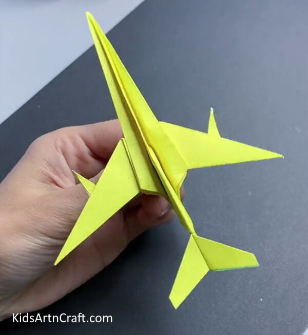 Making Folds In Tail - Create a paper aeroplane through a guide
