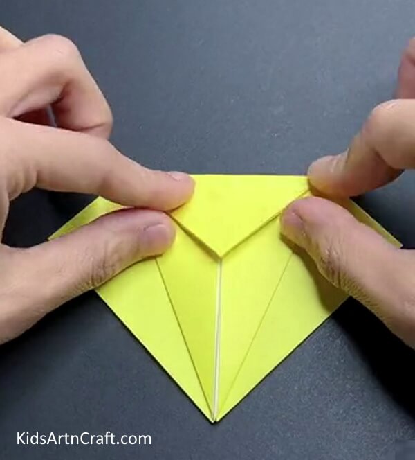 Folding Top Corner - Learn To Construct An Origami Airplane Through These Tutorials