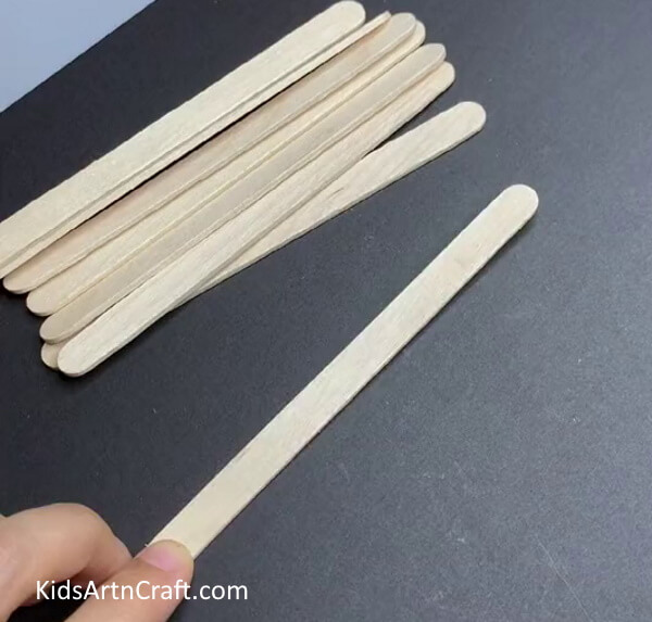 Getting Ready With Popsicle Sticks - An easy paper, cloud and rainbow craft for young ones.