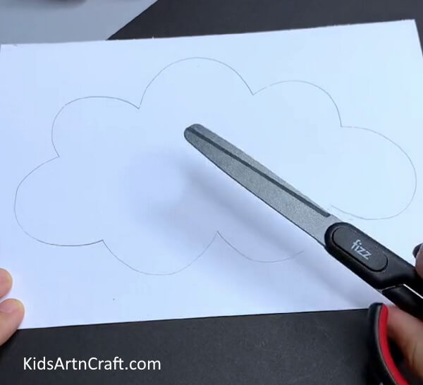 Cutting Cloud From White Paper - Charming Paper Cloud Rainbow Activity For Kindergartners To Fabricate