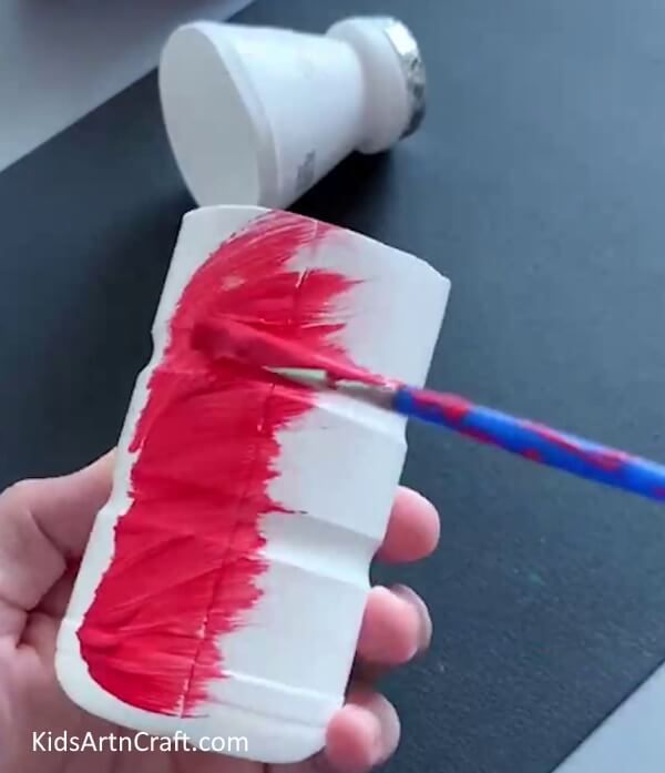 Coloring Bottle - Creating a dragon with paper and plastic containers is a straightforward project for youngsters. 