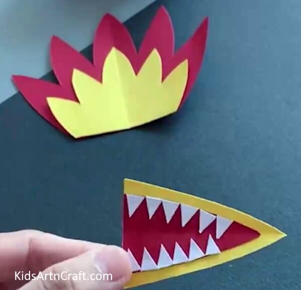 Adding Teeth - An easy paper and plastic bottle dragon craft made especially for kids. 