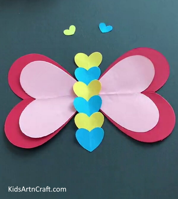 Pasting Mini Hearts For Antlers - Making a Paper Butterfly in the Form of a Heart