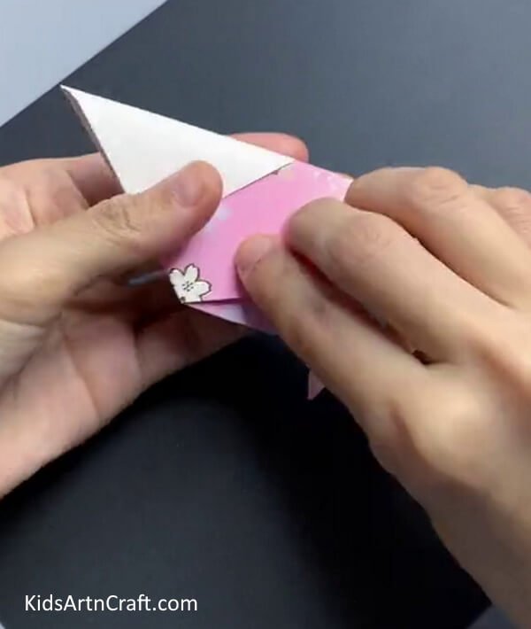 Folding In Half - A tutorial with clear instructions for making a paper bird.