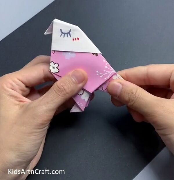 Adjusting Tail Of The Bird - Learn How to Make a Paper Bird with Detailed Instructions 