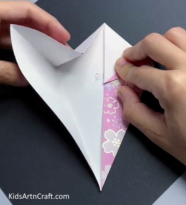 Folding Top Corners - A simple tutorial to make a paper bird.