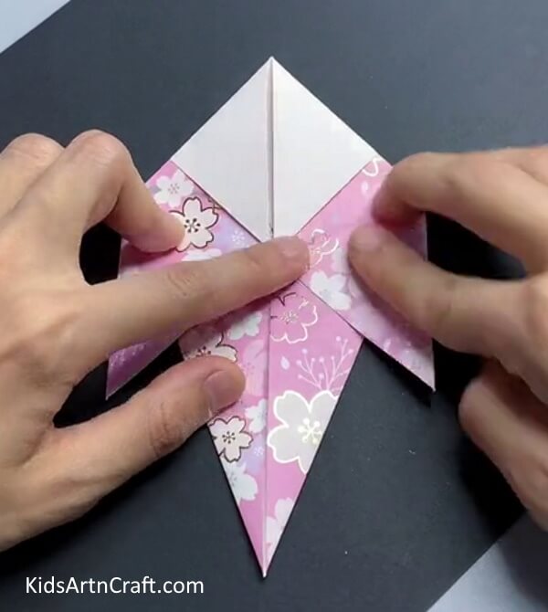Bringing Down the Right Corner - Instructions for making a paper bird on your own.