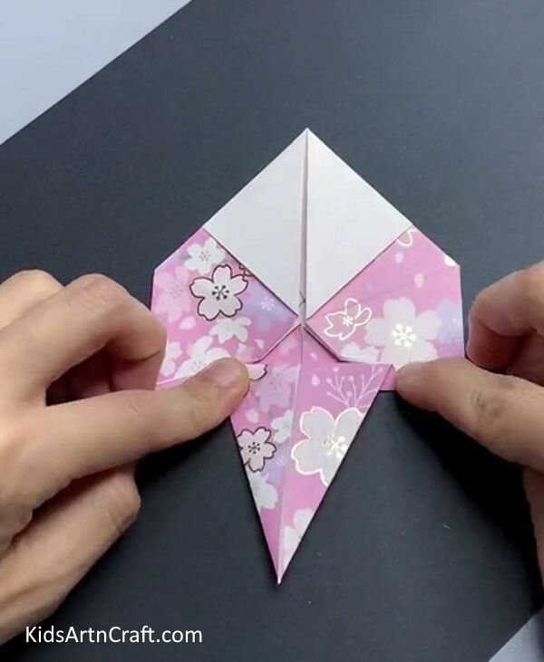 Bringing Triangle Down - A step-by-step guide to making a paper bird.