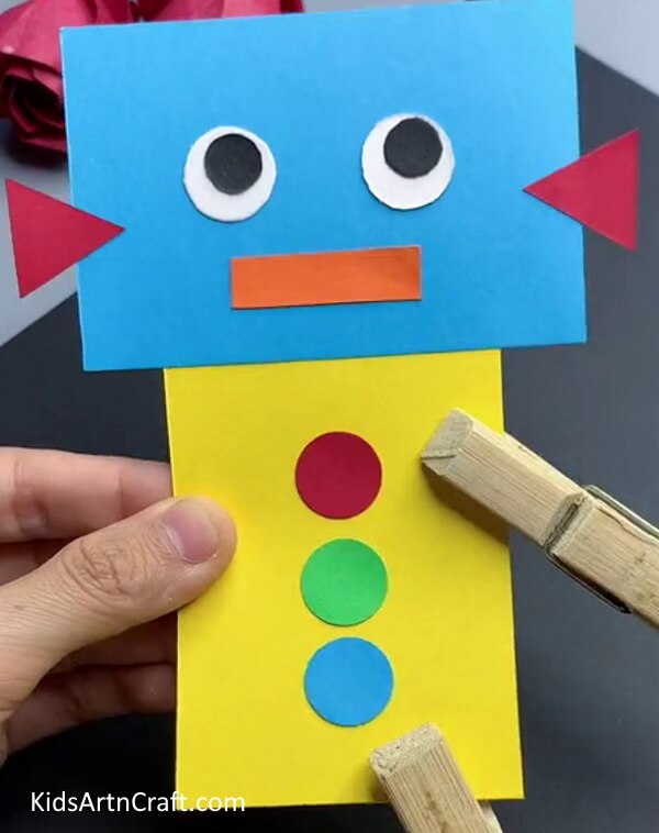 Adding Cloth Clips - Fabricate a fun and uncomplicated robot craft with paper.