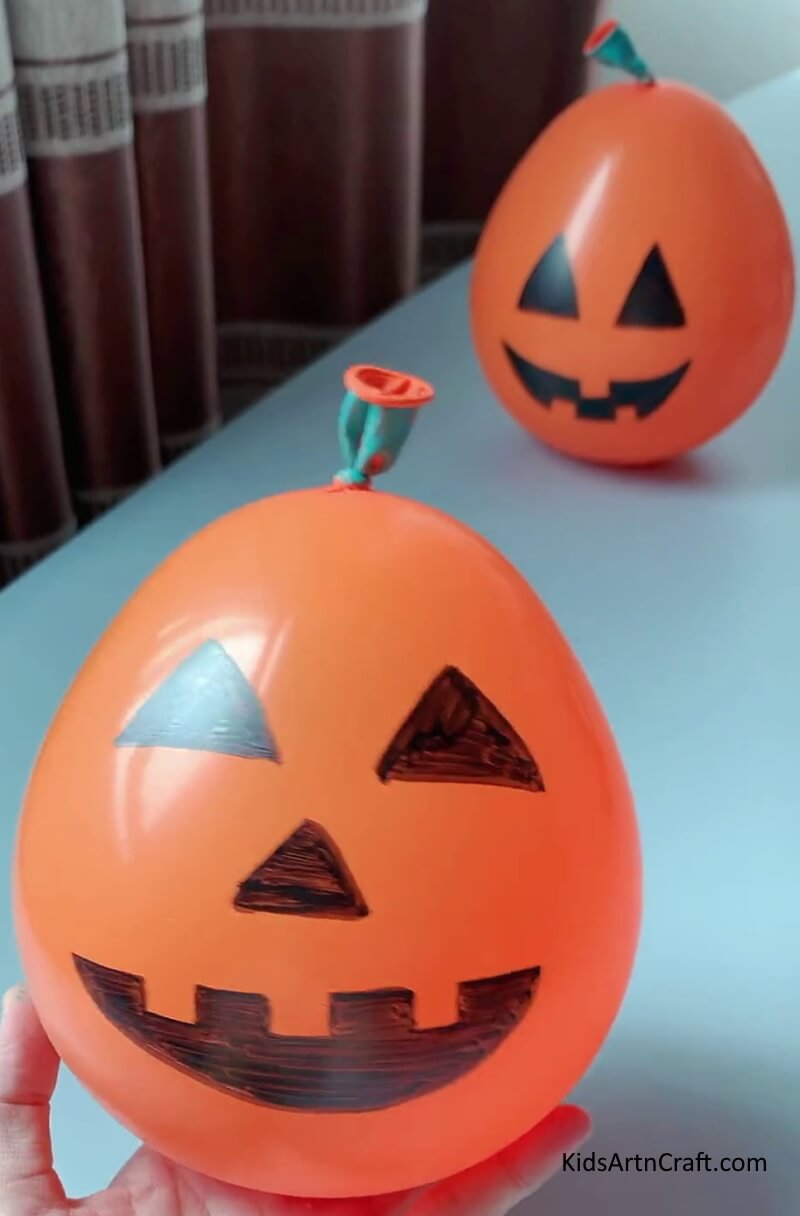 An Easy Halloween Art Piece With A Balloon Toy