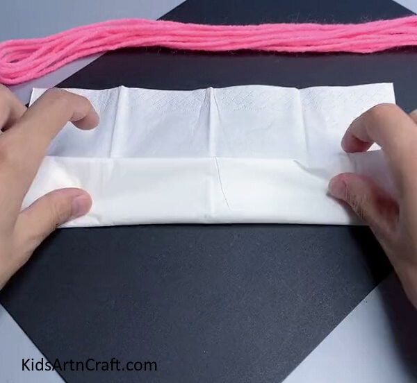 Folding Tissue Paper - Put Together a Doll with Yarn and Tissue Paper