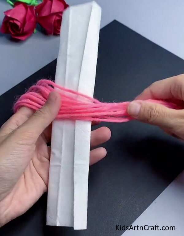 Wrapping Yarn - Constructing a Doll by Yarn and Tissue Paper