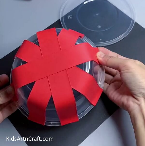 Covering Box With Strips - How to Construct a Ladybug with Lightning for Kids in a Few Easy Steps