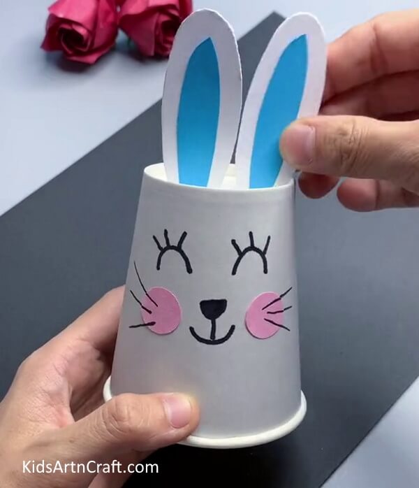 Pasting Ears of Bunny - A Tutorial Showing How to Create a Bunny from a Paper Cup for Kids