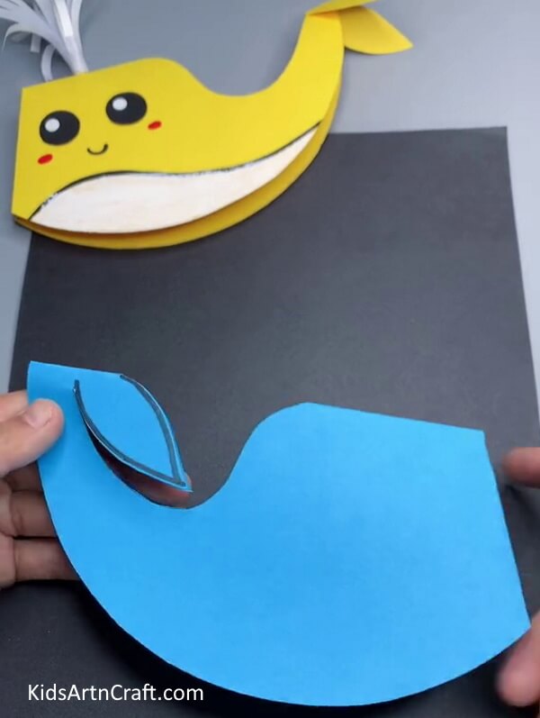 Cutting the Making Whale - Making a Paper Whale Craft - What Kids Need to Do 