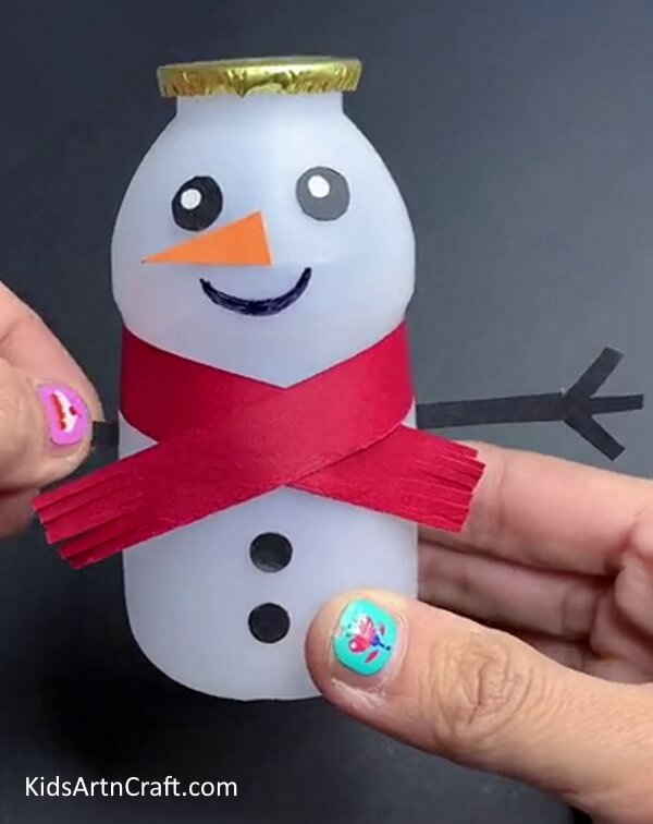Pasting Hands - Instructions for Crafting a Snowman using a Bottle 